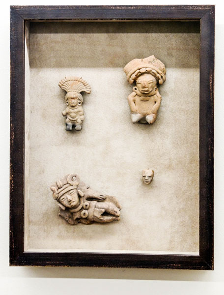Collection of Stone Figures Framed