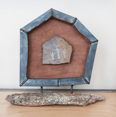 Petroglyph mounted in multi-sided IBOK Steel Frame that follows the contours of the stone.